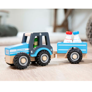 Traktor mit Anhänger und Milchflaschen