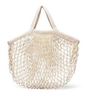 HEVEA Sandförmchen-Set mit Schippe im Tragenetz - Naturkautschuk / upcycled